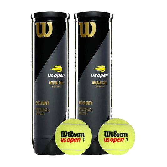 Two black tennis ball cans with gold logos and text, labeled 'US Open Extra Duty'.